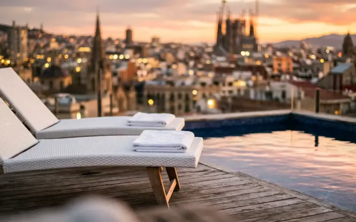 Rooftop pool loungers at sunset (illustrative AI image)